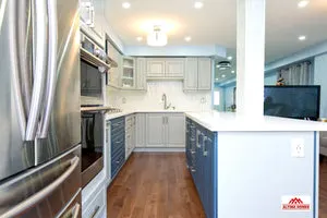 Blue & Grey Kitchen - Altima Homes Inc.