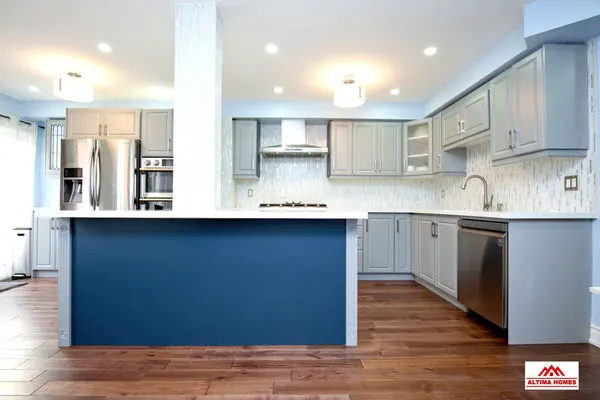 Blue & Grey Kitchen - Altima Homes Inc.
