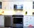 Small All-White Kitchen - Altima Homes Inc.