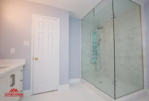 Large Master Bathroom with Vintage Style Tub - Altima Homes Inc.