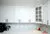 All-White Marble Blacksplash Kitchen - Altima Homes Inc.
