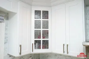 All-White Marble Blacksplash Kitchen - Altima Homes Inc.