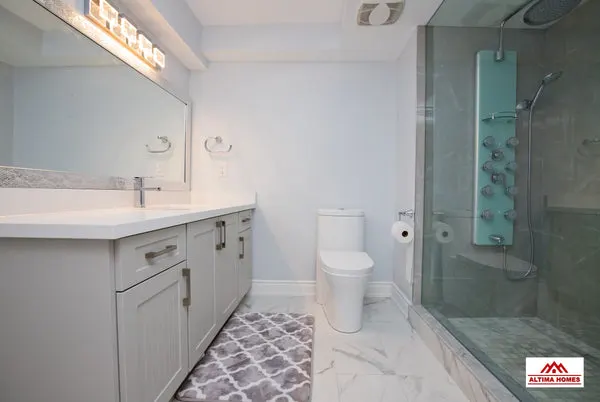 Luxurious Basement Bathroom - Altima Homes Inc.
