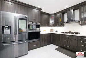 Classic Kitchen With Brown Cabinets - Altima Homes Inc.
