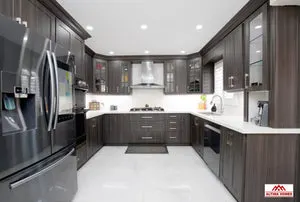 Classic Kitchen With Brown Cabinets - Altima Homes Inc.