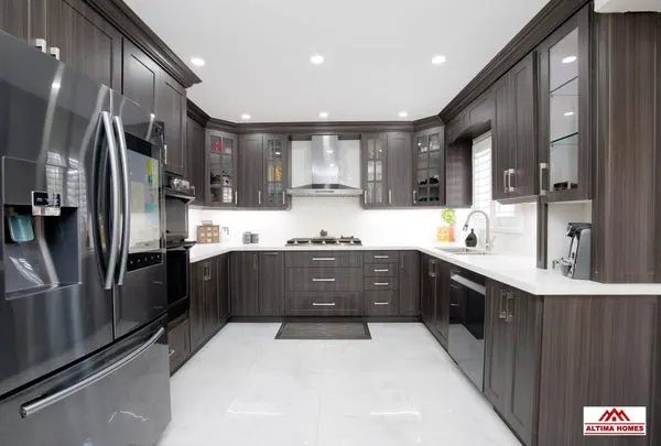 Classic Kitchen With Brown Cabinets - Altima Homes Inc.