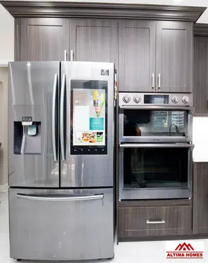 Classic Kitchen With Brown Cabinets - Altima Homes Inc.