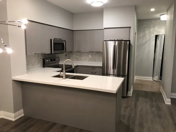 Square Condo Kitchen - Altima Homes Inc.