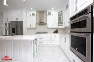 All-White Marble Floor Quartz Countertop Kitchen - Altima Homes Inc.