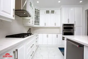 All-White Marble Floor Quartz Countertop Kitchen - Altima Homes Inc.