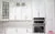 All-White Marble Floor Quartz Countertop Kitchen - Altima Homes Inc.