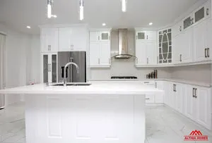 All-White Marble Floor Quartz Countertop Kitchen - Altima Homes Inc.